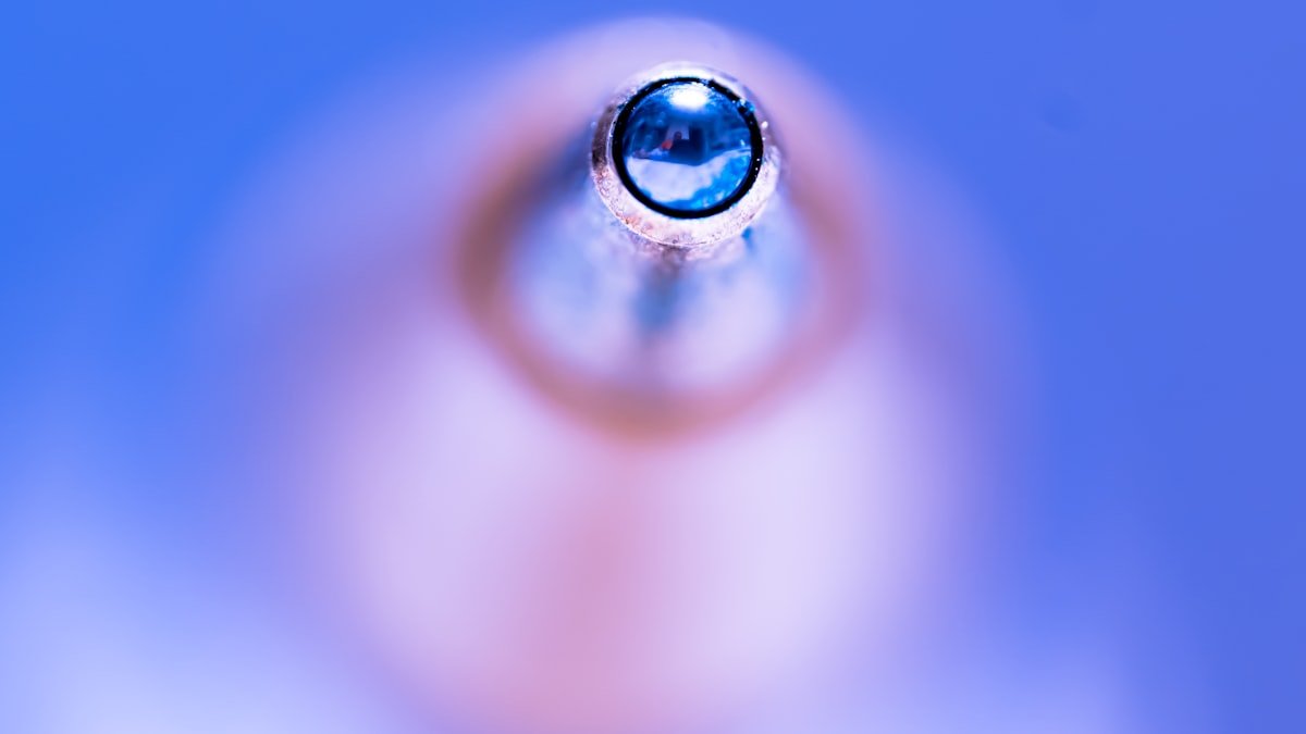 Methylene blue benefits explained with deep blue liquid in a dropper